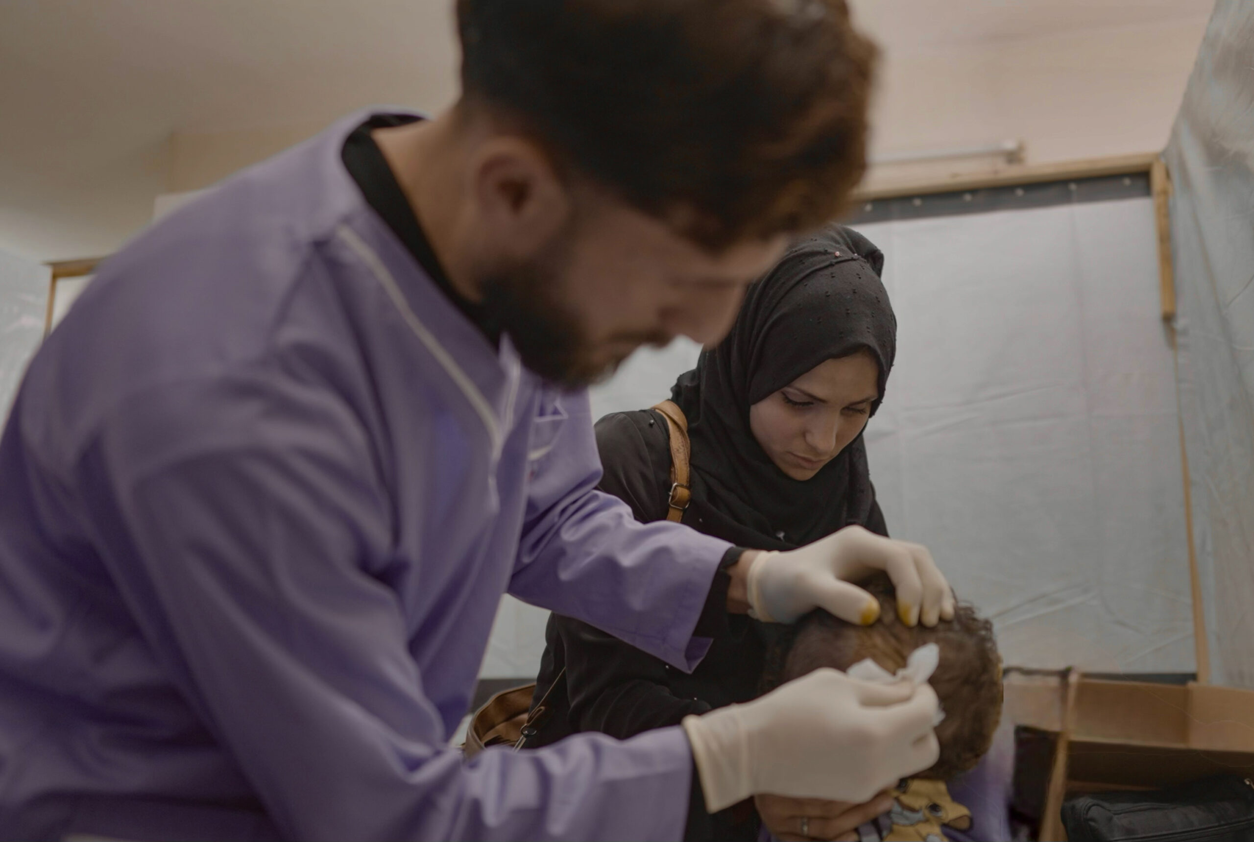 Salami Mohammad Saad's son receives treatment at Caritas his hospital in Gaza. (Photo: Raw media/Trócaire)